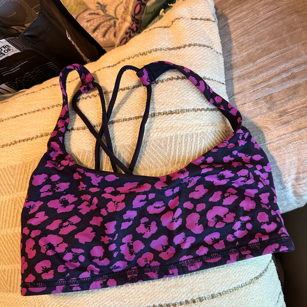 Lululemon Free To Be Black Crisscross Strap Sports bra with fuchsia flower print